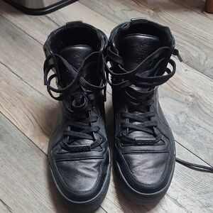 Gucci  Guccissima Black Leather High-Top Sneakers